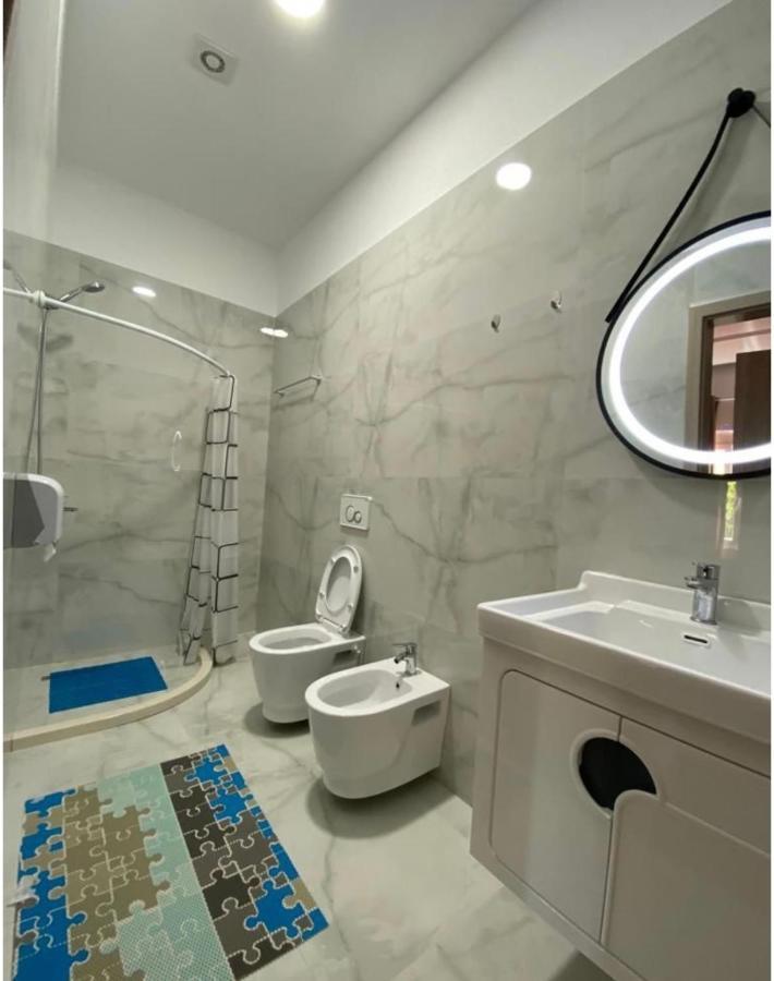 Lundra Hotel Gramsh Bagian luar foto